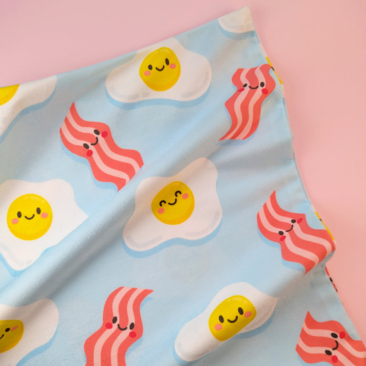 Bacon and Eggs cushion cover 40x40cm by Sarah Epstein Studio.