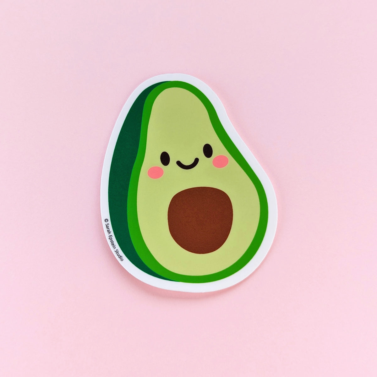 Kawaii avocado die-cut vinyl sticker by Sarah Epstein Studio.