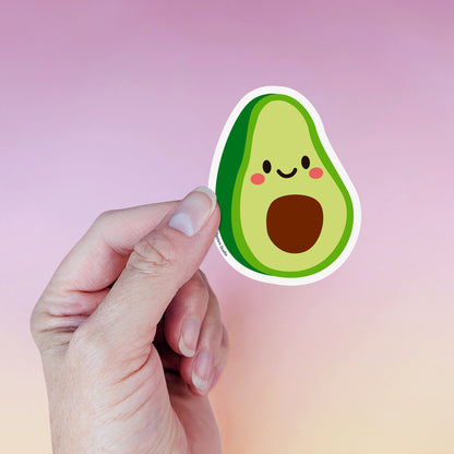 Kawaii avocado die-cut vinyl sticker by Sarah Epstein Studio.
