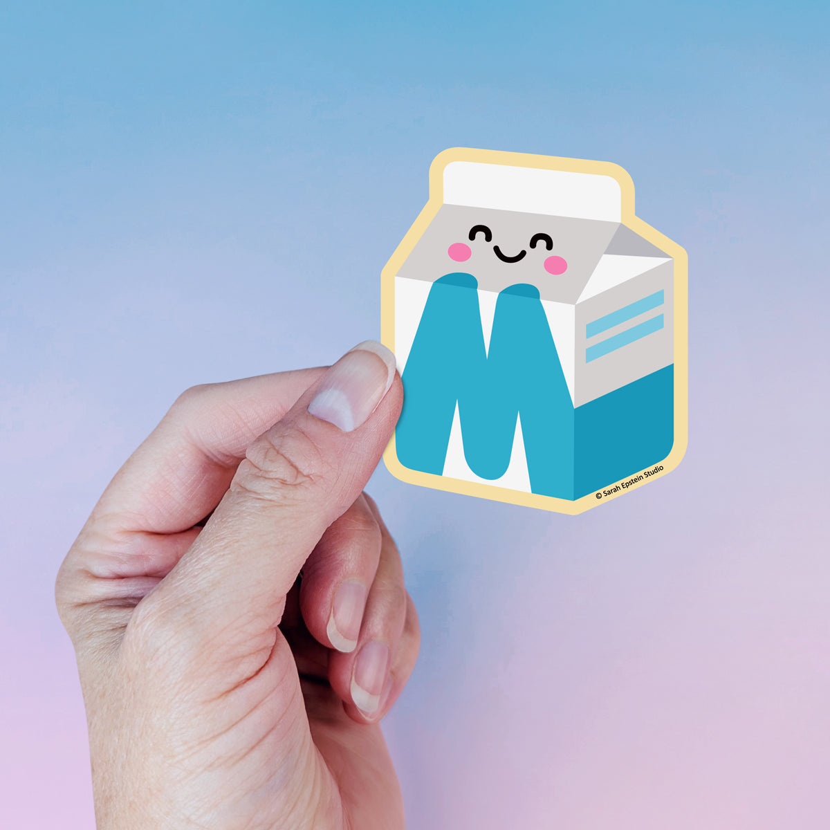 Kawaii Big M die-cut vinyl sticker by Sarah Epstein Studio.