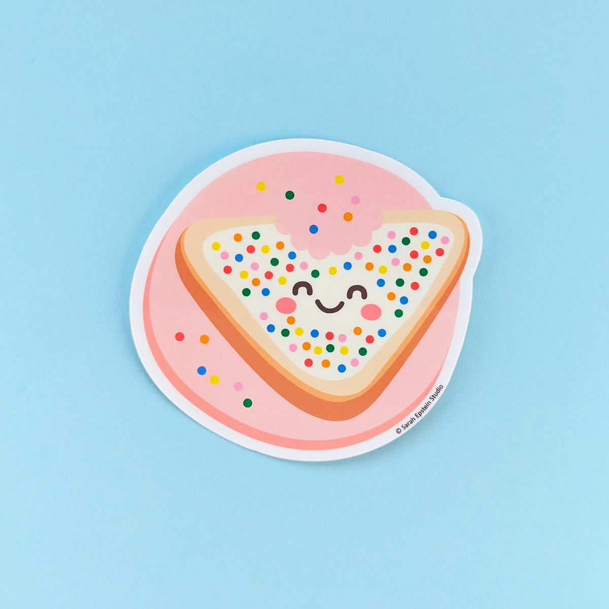Kawaii fairy bread die-cut vinyl sticker by Sarah Epstein Studio.