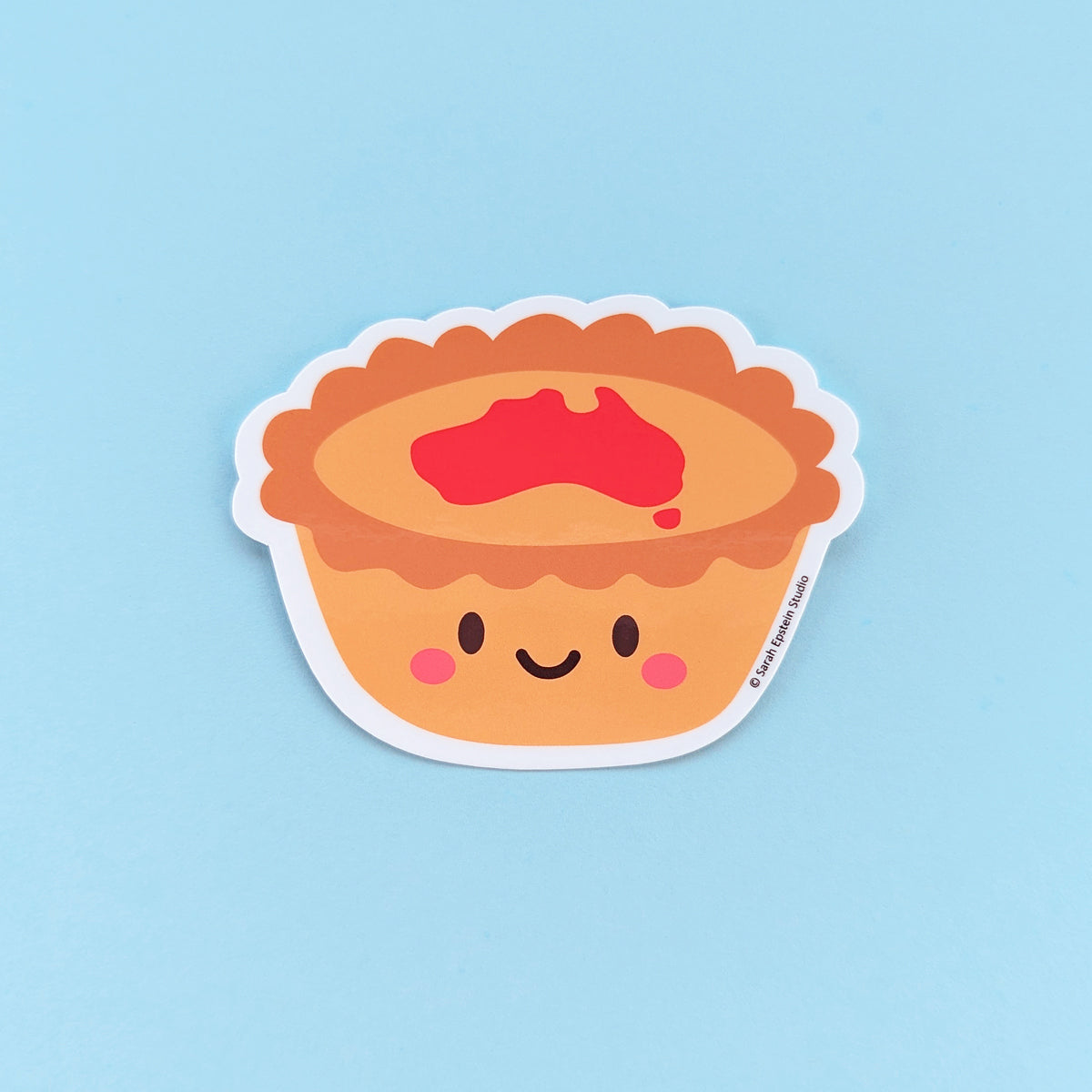 Kawaii meat pie die-cut vinyl sticker by Sarah Epstein Studio.
