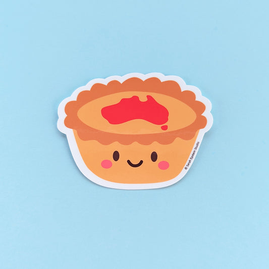 Kawaii meat pie die-cut vinyl sticker by Sarah Epstein Studio.