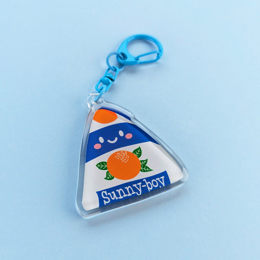 Kawaii Sunny Boy acrylic keychain by Sarah Epstein Studio.
