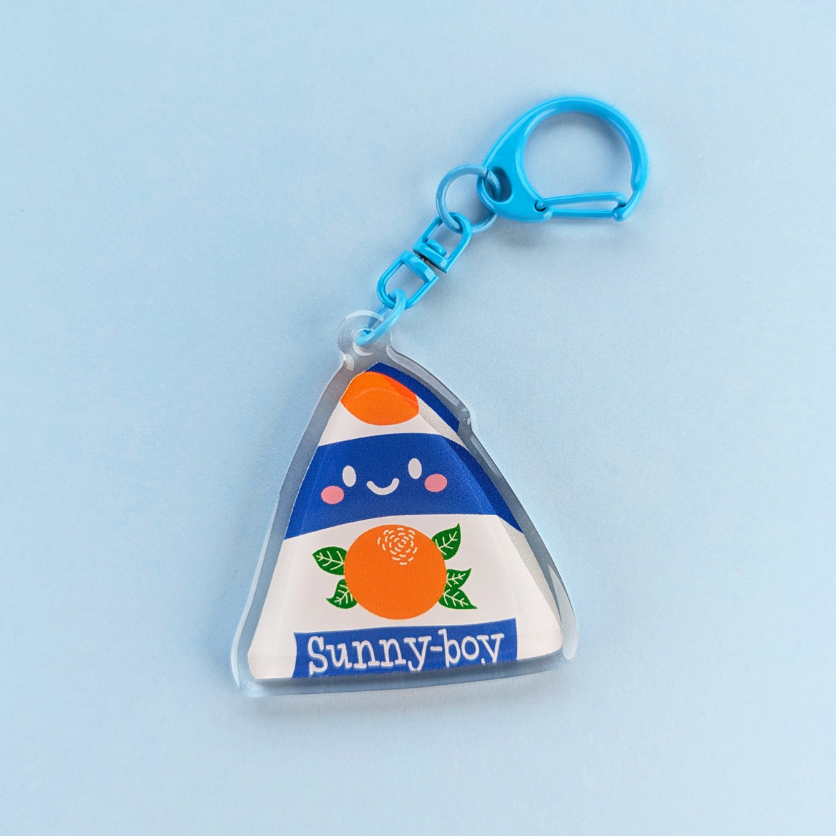 Kawaii Sunny Boy acrylic keychain by Sarah Epstein Studio.