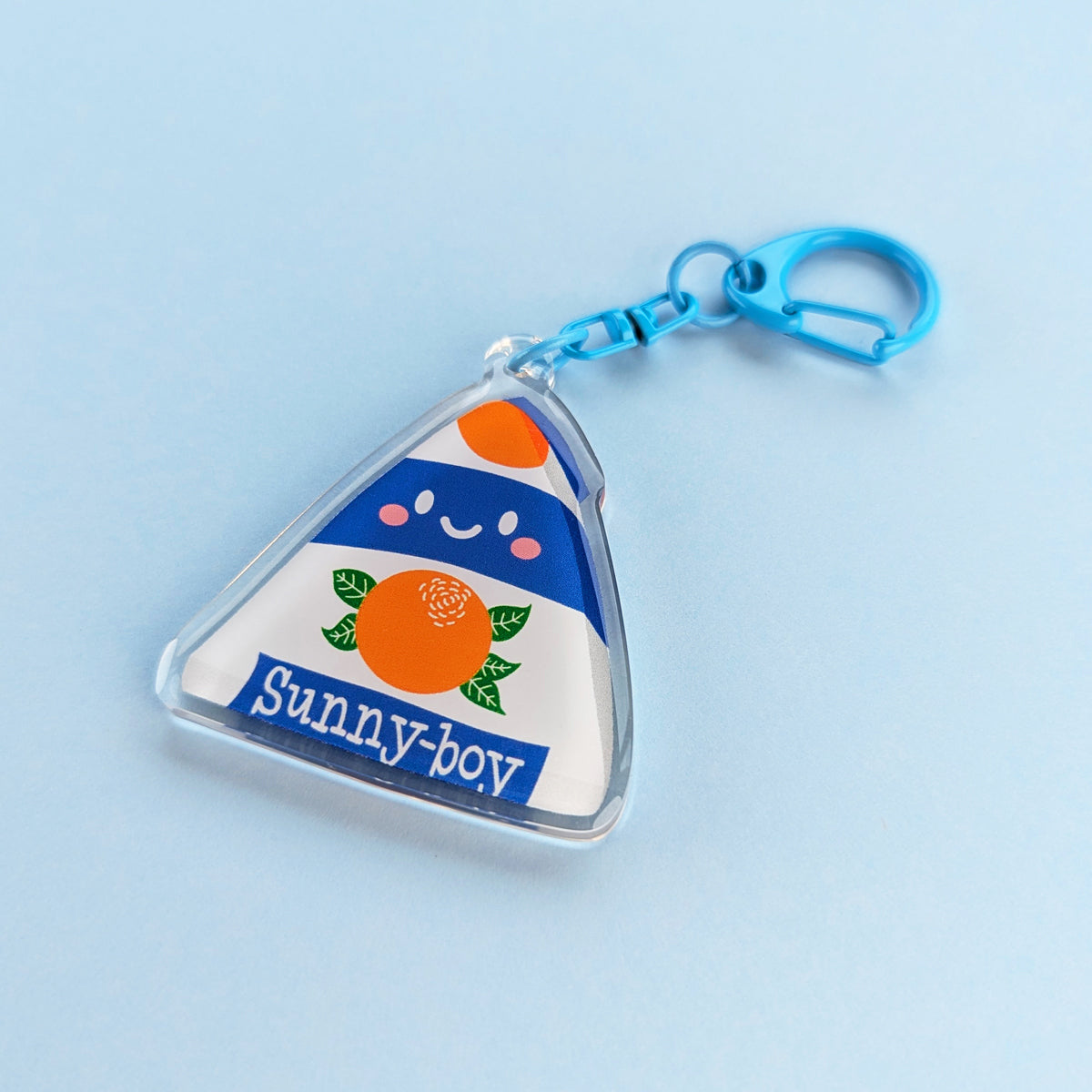 Kawaii Sunny Boy acrylic keychain by Sarah Epstein Studio.