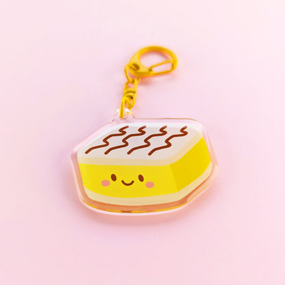 Kawaii vanilla slice acrylic keychain by Sarah Epstein Studio.