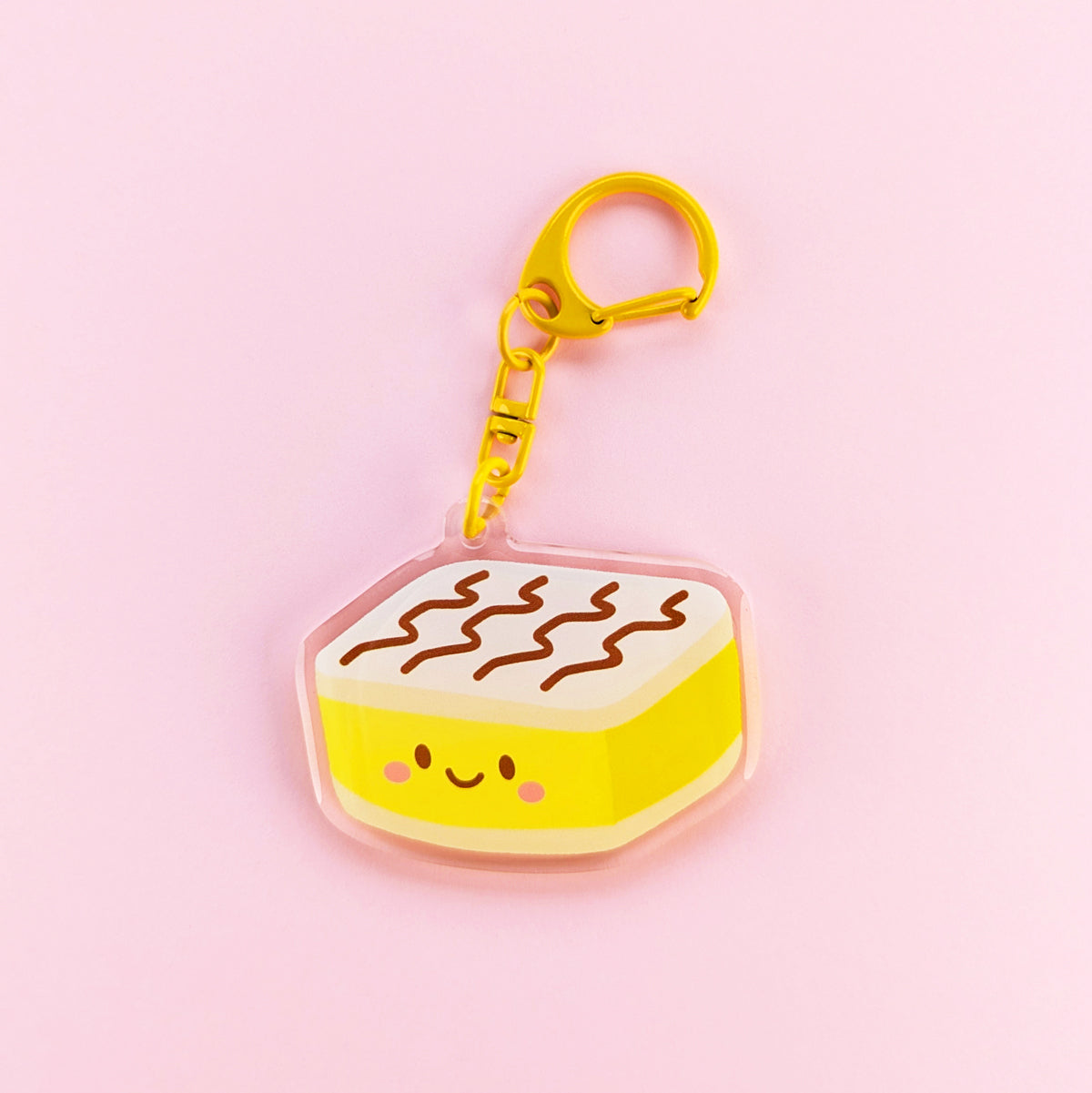 Kawaii vanilla slice acrylic keychain by Sarah Epstein Studio.