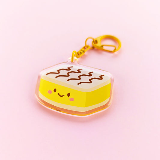 Kawaii vanilla slice acrylic keychain by Sarah Epstein Studio.