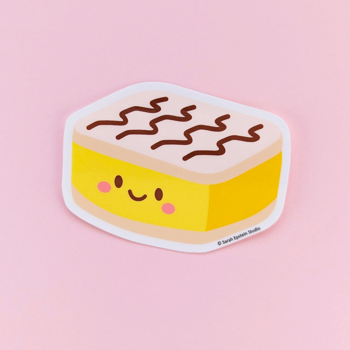 Kawaii vanilla slice die-cut vinyl sticker by Sarah Epstein Studio.
