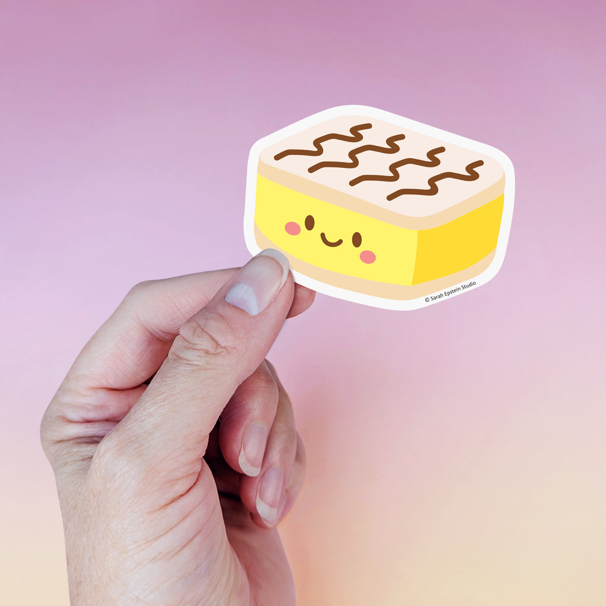 Kawaii vanilla slice die-cut vinyl sticker by Sarah Epstein Studio.