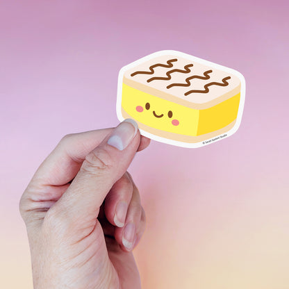 Kawaii vanilla slice die-cut vinyl sticker by Sarah Epstein Studio.
