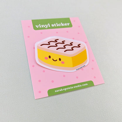 Kawaii vanilla slice die-cut vinyl sticker by Sarah Epstein Studio.