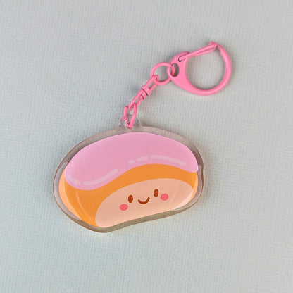 Kawaii finger bun acrylic keychain by Sarah Epstein Studio.