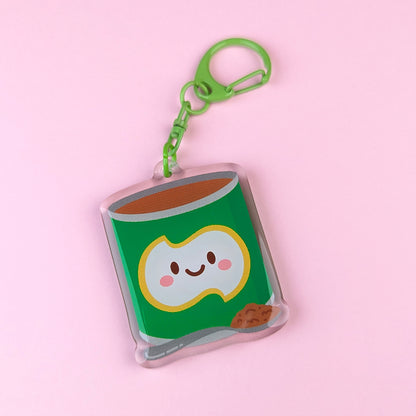 Kawaii Milo tin acrylic keychain by Sarah Epstein Studio.