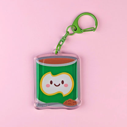 Kawaii Milo tin acrylic keychain by Sarah Epstein Studio.