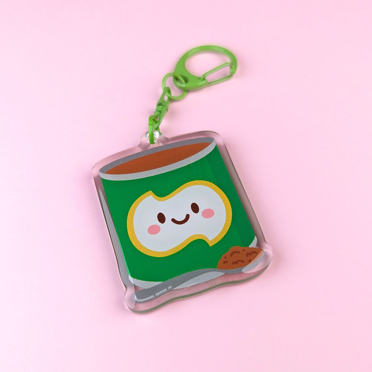 Kawaii Milo tin acrylic keychain by Sarah Epstein Studio.