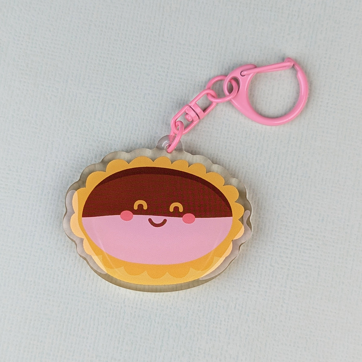 Kawaii neenish tart acrylic keychain by Sarah Epstein Studio.