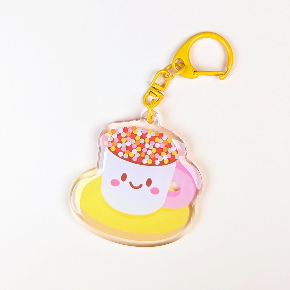 Kawaii Teacup Biscuit acrylic keychain by Sarah Epstein Studio.
