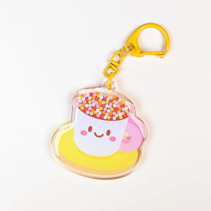 Kawaii Teacup Biscuit acrylic keychain by Sarah Epstein Studio.