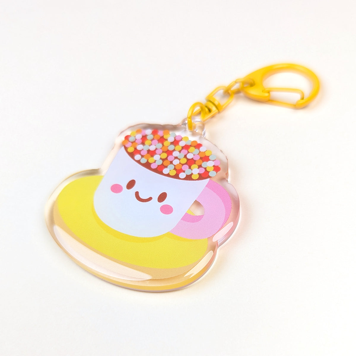 Kawaii Teacup Biscuit acrylic keychain by Sarah Epstein Studio.