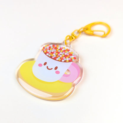 Kawaii Teacup Biscuit acrylic keychain by Sarah Epstein Studio.