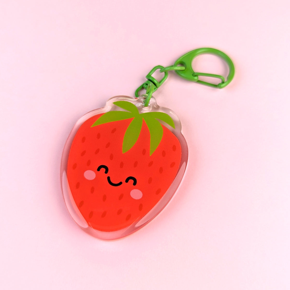 Kawaii Strawberry acrylic keychain by Sarah Epstein Studio.