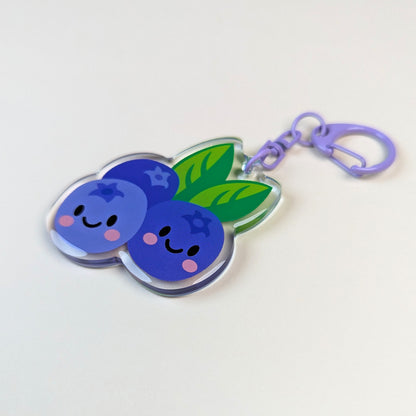 Kawaii Blueberries acrylic keychain by Sarah Epstein Studio.