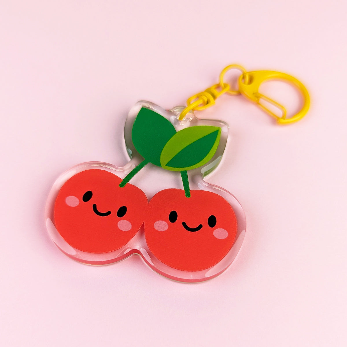 Kawaii Cherries acrylic keychain by Sarah Epstein Studio.
