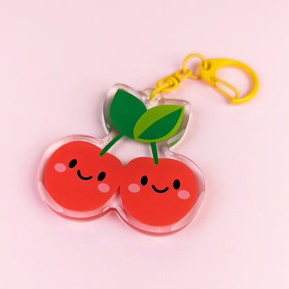 Kawaii Cherries acrylic keychain by Sarah Epstein Studio.