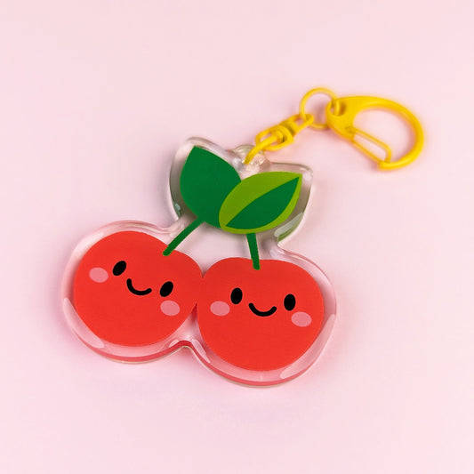 Kawaii Cherries acrylic keychain by Sarah Epstein Studio.